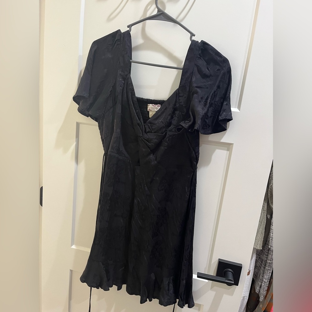 Twist front silk dress.